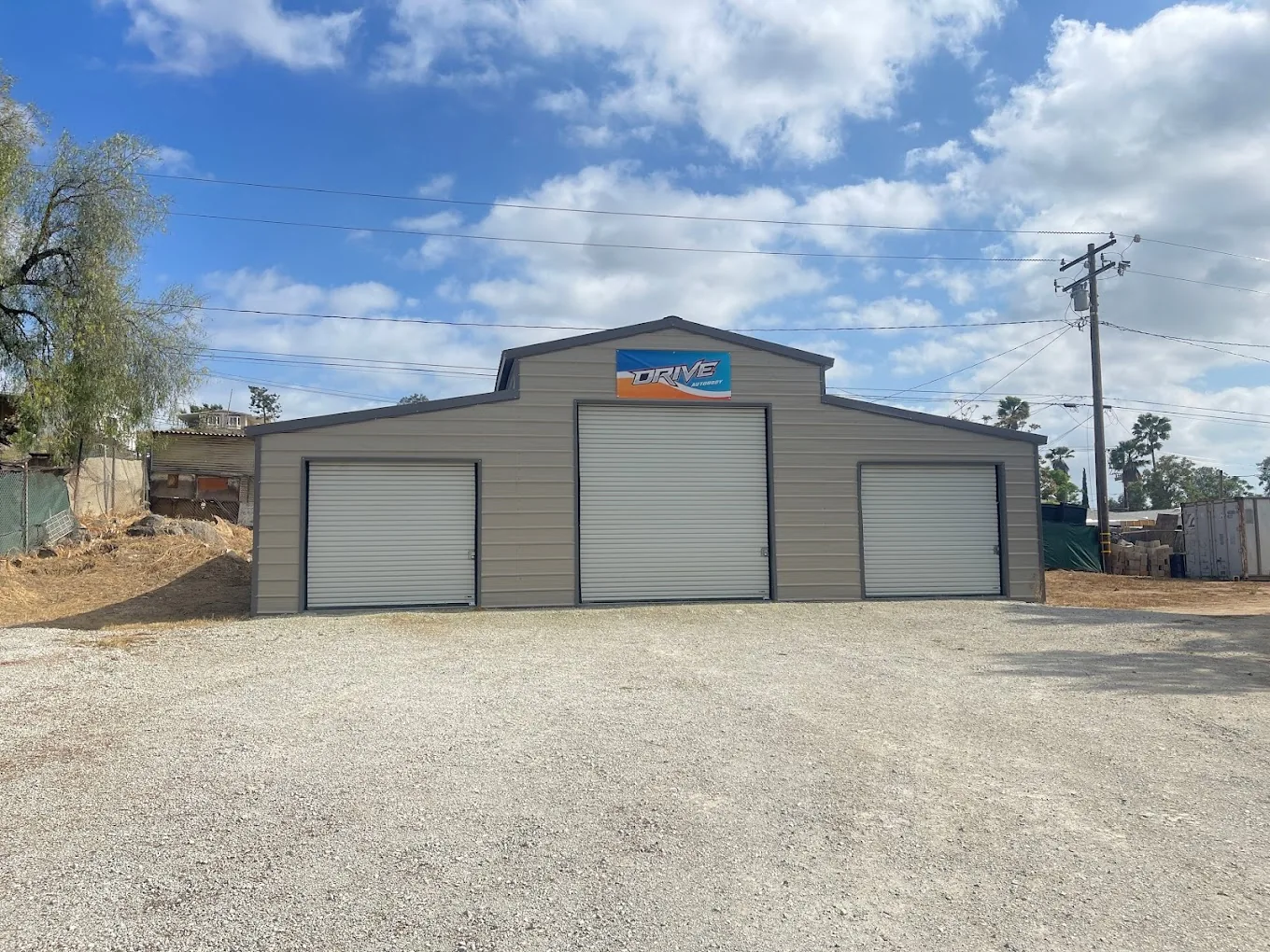 Drive Auto Body shop exterior in Hemet, CA — collision repair facility on State Highway 74